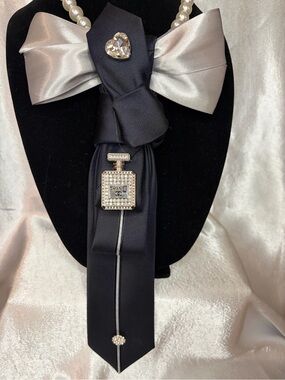 Express Black and Silver Satin Bow Necklace with Crystal Perfume Charm